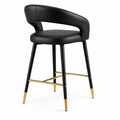 Chaise de bar en cuir avec pieds métalliques noirs et dorés